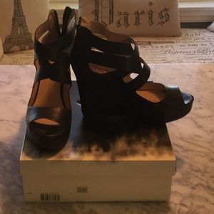 Barely worn black wedges by dv